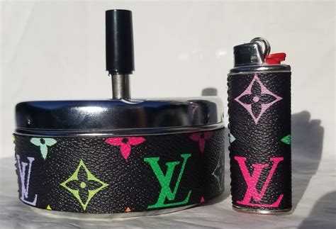 louis vuitton lighter and ashtray.